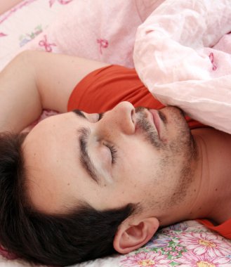 Portrait of a young man sleeping.