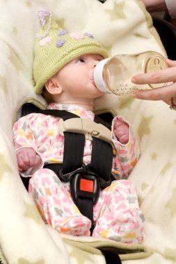 Newborn Being Bottle Fed clipart