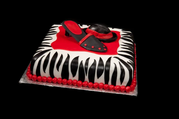 Hatt och sko på zebramönster tårta — Stockfoto