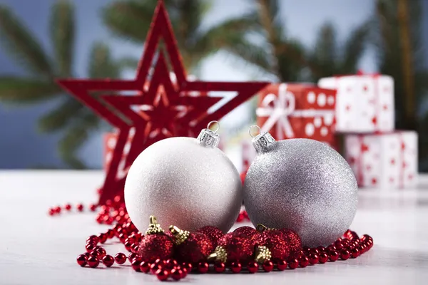 Christmas background with baubles and gift — Stock Photo, Image