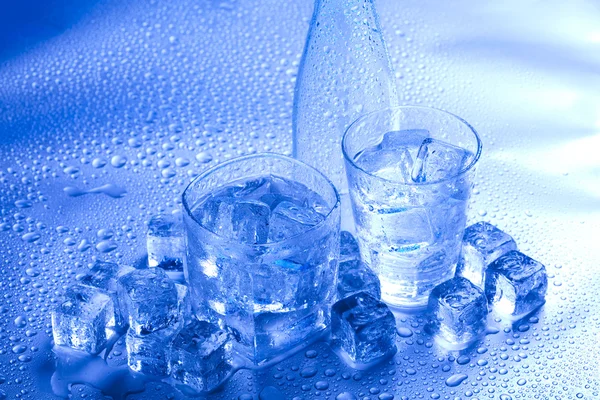 Blue and shiny ice cubes Stock Image