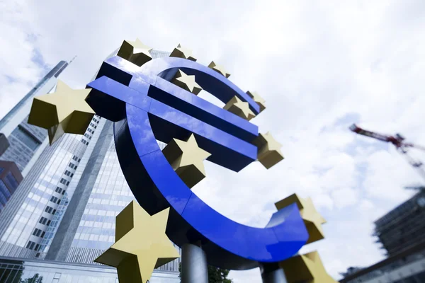 Euro sign and city — Stock Photo, Image