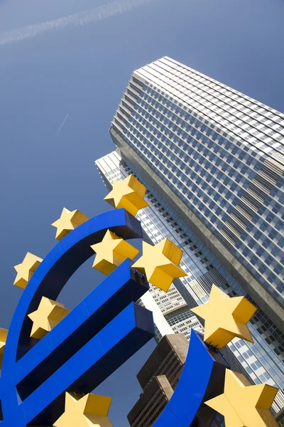 Segno euro e città — Foto Stock