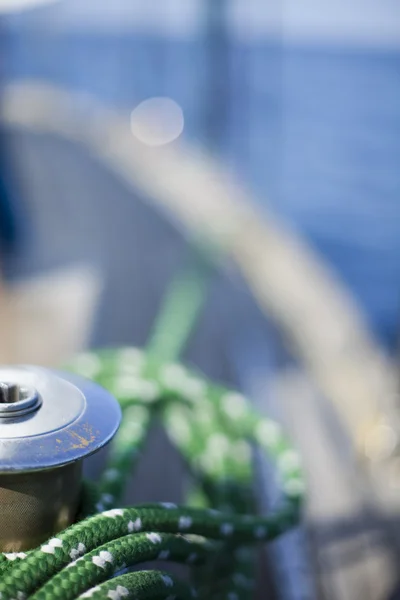 stock image Winch with rope on sailing boat in the sea