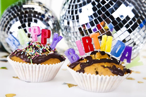 Cupcakes spelling out happy birthday — Stock Photo, Image