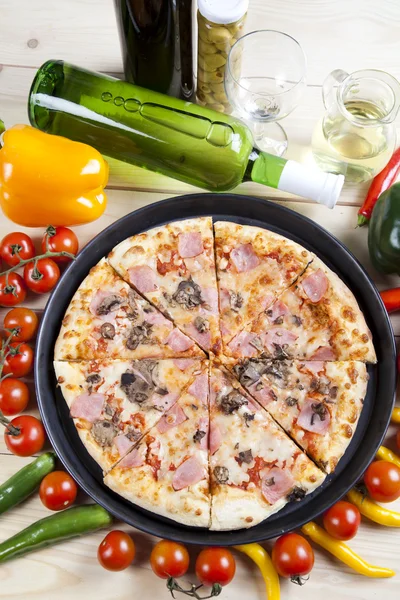 Supreme pizza in pan — Stock Photo, Image