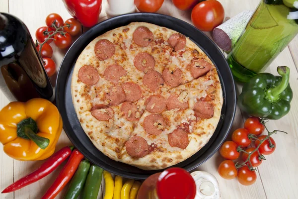 Supreme pizza in pan — Stock Photo, Image