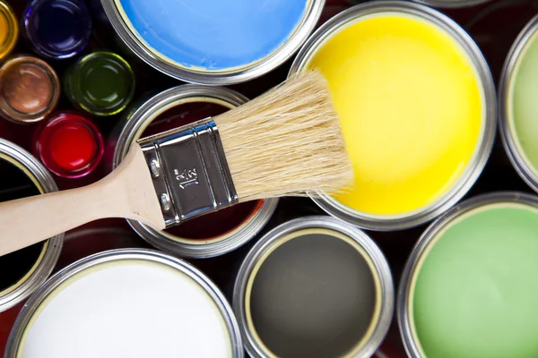 Cans of paint with paintbrush — Stock Photo, Image