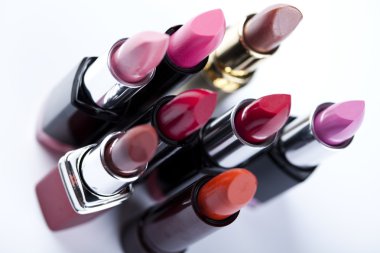 Lipsticks on white background clipart