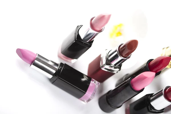Lipsticks op witte achtergrond — Stockfoto