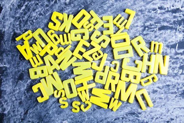 Alphabet and letters on a school blackboard — Stock Photo, Image