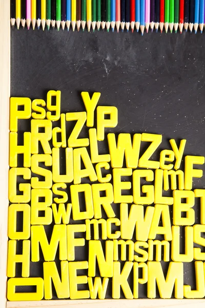 Litery z alfabetu & tablica — Zdjęcie stockowe