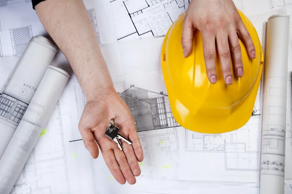 The achitecture plan in human hands — Stock Photo, Image