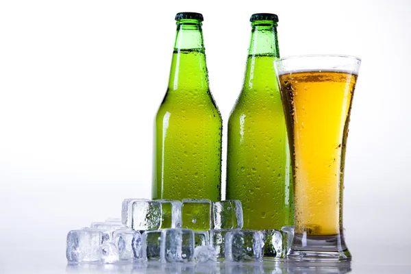Beer bottle and glass Royalty Free Stock Images