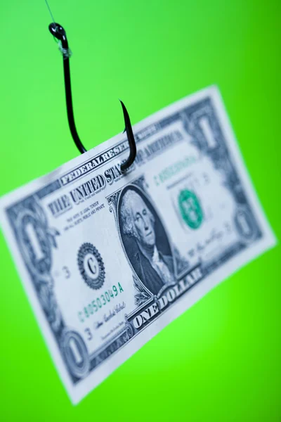 Знак доллара на листе бумаги на крючке — стоковое фото