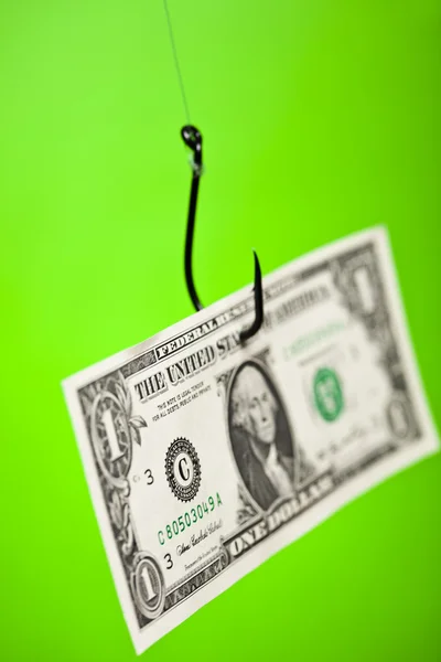 Signo de dólar en papel en gancho — Foto de Stock