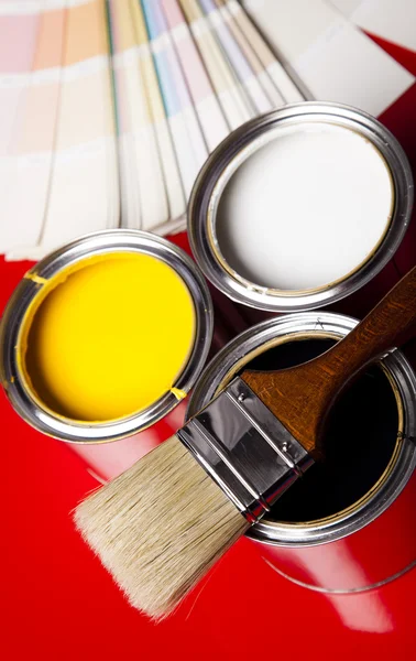 Paint buckets, paint and brush — Stock Photo, Image