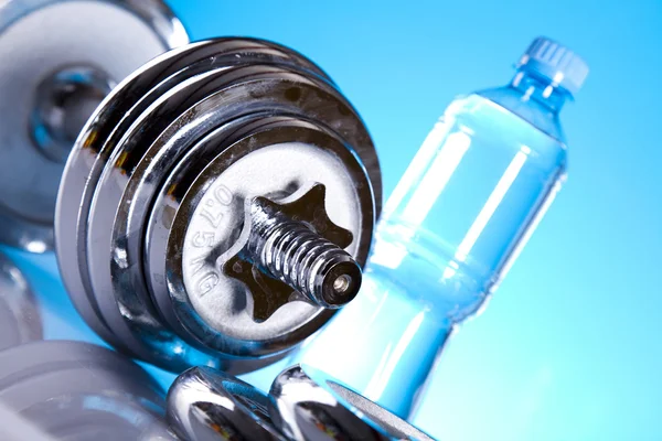 Dumbbell and bottle water — Stock Photo, Image