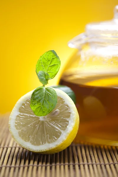 stock image Glass teapot of tea