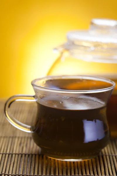 Glass teapot and green tea — Stock Photo, Image