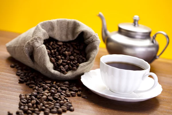 Cup with beans coffee — Stock Photo, Image
