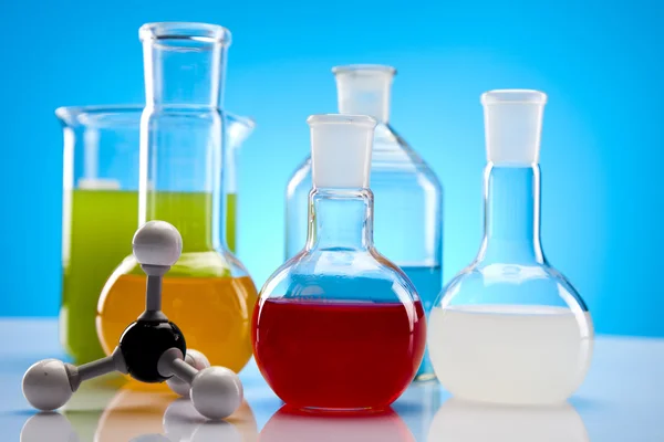 Laboratory flasks with fluids of different colors Stock Photo