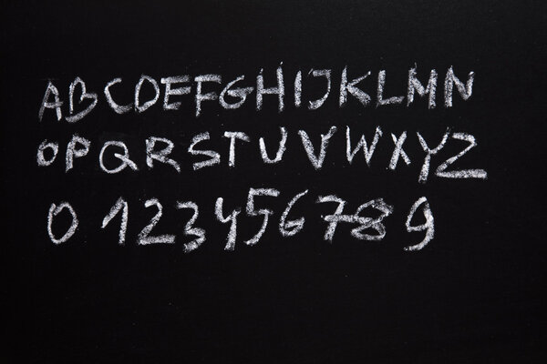 Alphabet and letters on a school blackboard