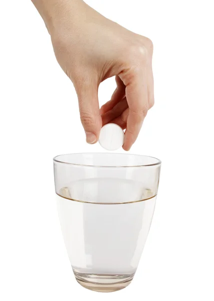 Effervescence tablet and a glass of water — Stock Photo, Image