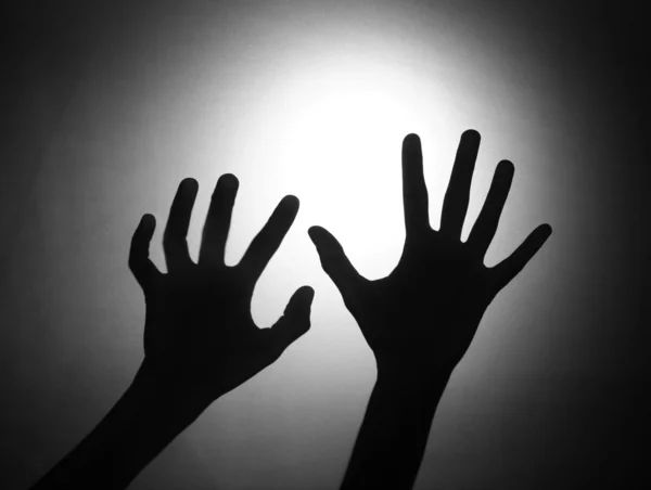 Silhouette von zwei Händen — Stockfoto