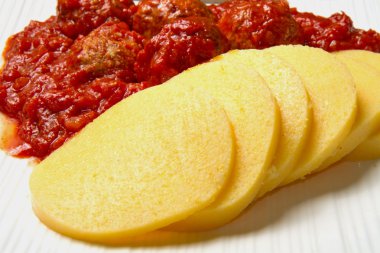 ​​polenta with meatballs clipart