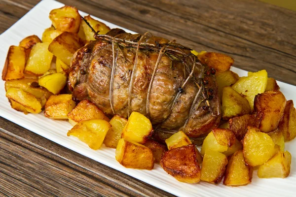 stock image Roast beef sliced with potatoes