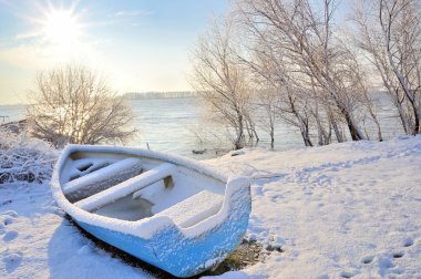 Blue boat on danube river clipart