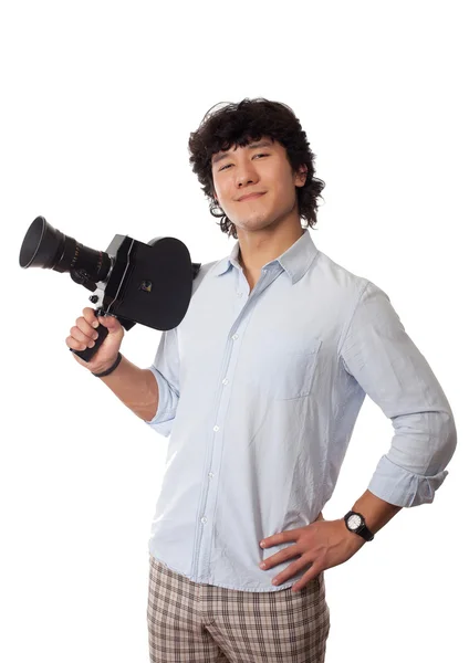 Азиатский мужчина со старой камерой в руке — стоковое фото