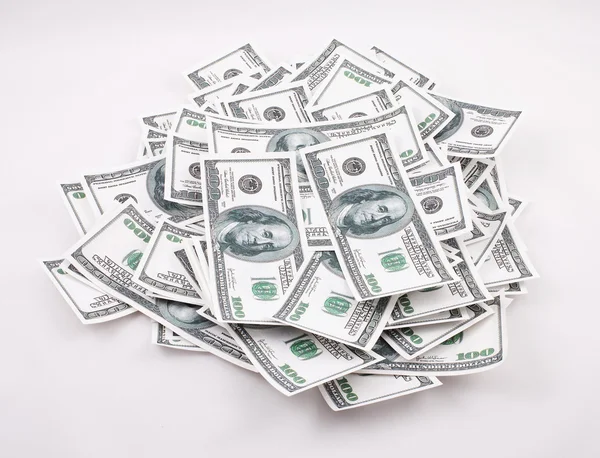 Many dollars over white background — Stock Photo, Image