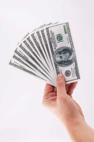 Peníze v rukou člověka na bílé bg — Stock fotografie