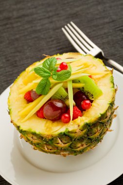 Pineapple stuffed with fruits clipart