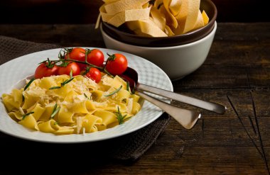 Pasta with cheese and rosemary clipart