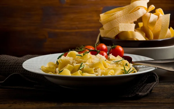Pasta with cheese and rosemary — Stock Photo, Image