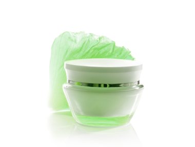 Jar of cream and soft green petal clipart