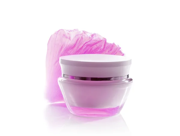 Jar of cream and soft pink petal — Stock Photo, Image
