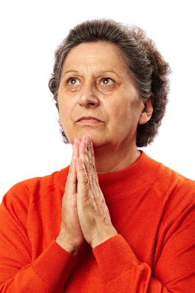 Ηλικιωμένη γυναίκα προσεύχεται — Φωτογραφία Αρχείου