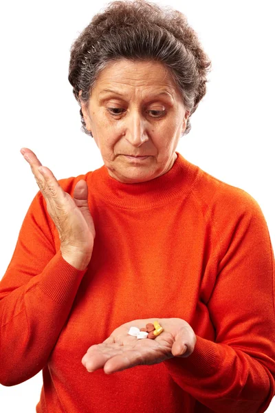 Starší žena s příliš mnoho prášky — Stock fotografie