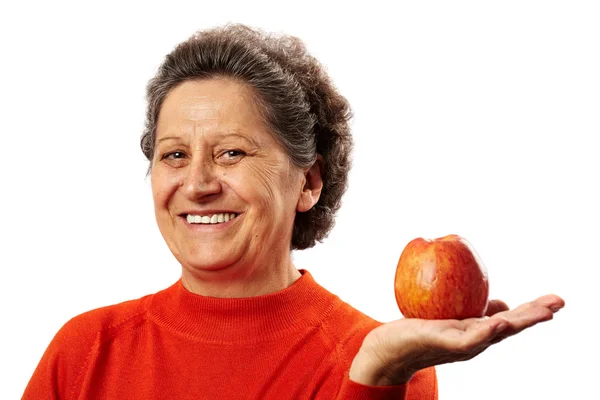 Ανώτερος γυναίκα με μήλο — Φωτογραφία Αρχείου