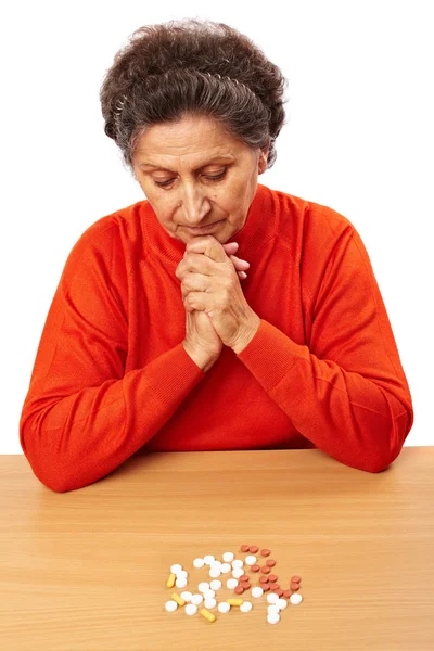 Senior woman with too many pills — Stock Photo, Image