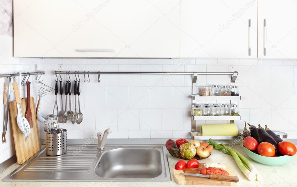 Kitchen interior with fresh vegetables