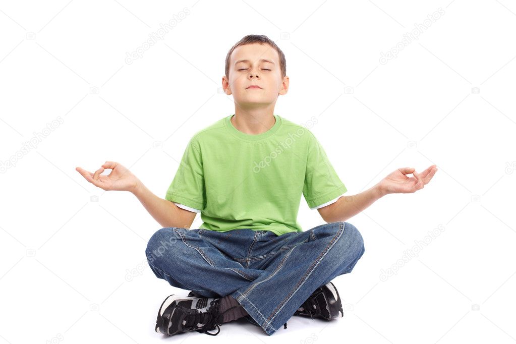 10 years old boy meditating
