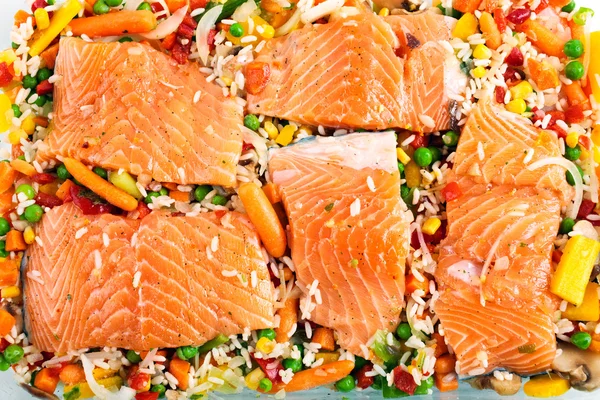 Salmon fillets with garnish — Stock Photo, Image