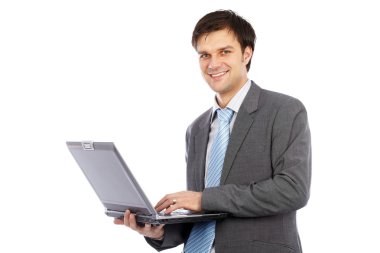 genç işadamı holding laptop