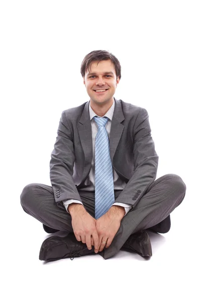 Бізнесмен сидить на підлозі — стокове фото