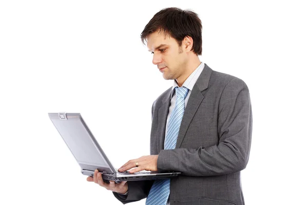 Genç işadamı holding laptop — Stok fotoğraf
